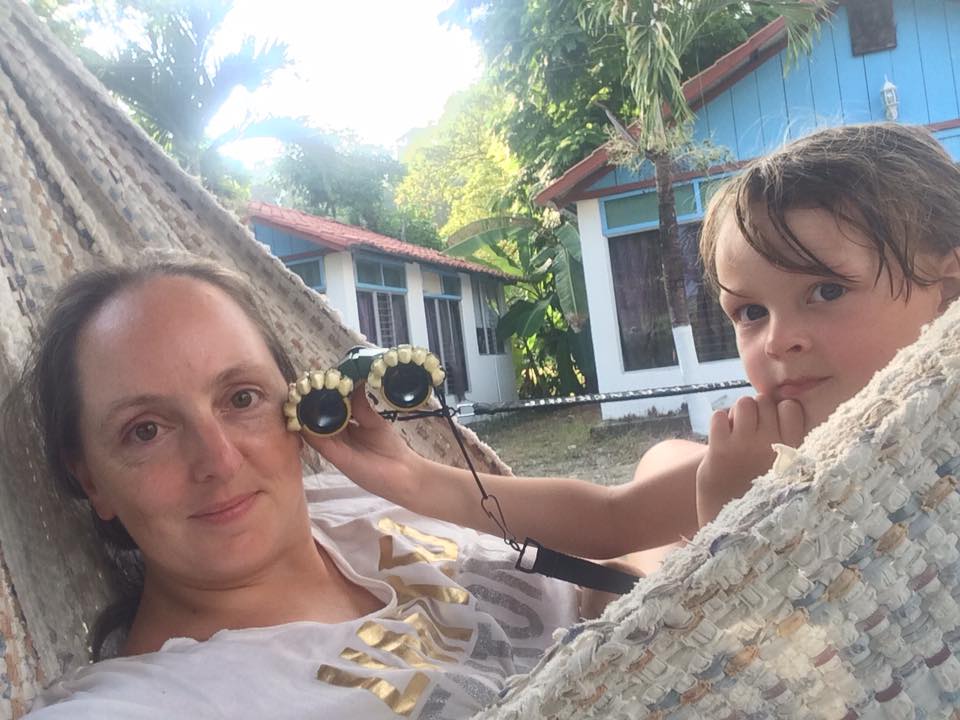 Tyler at aged 4 and Laura sat in a hammock