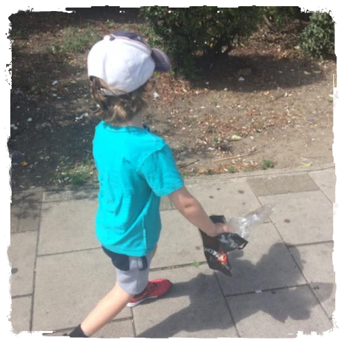 Tyler David carring packets to the bin